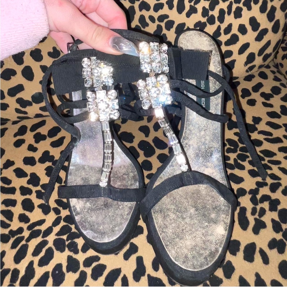 Black Dsquared2 strappy heels, rhinestone buckle detail #glamour